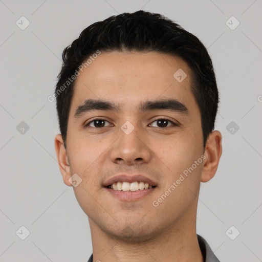 Joyful latino young-adult male with short  black hair and brown eyes