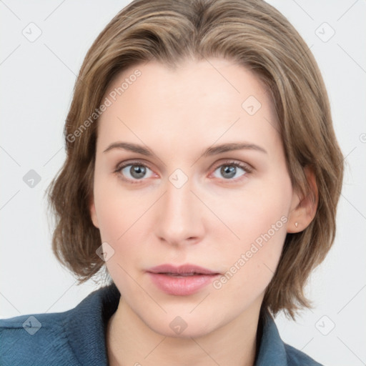 Neutral white young-adult female with medium  brown hair and grey eyes