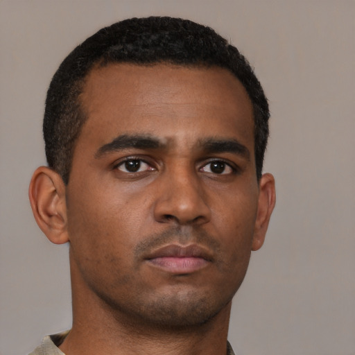 Neutral black young-adult male with short  brown hair and brown eyes