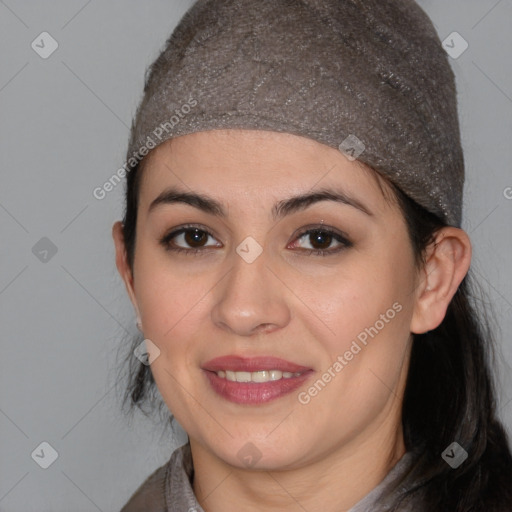 Joyful white young-adult female with medium  black hair and brown eyes