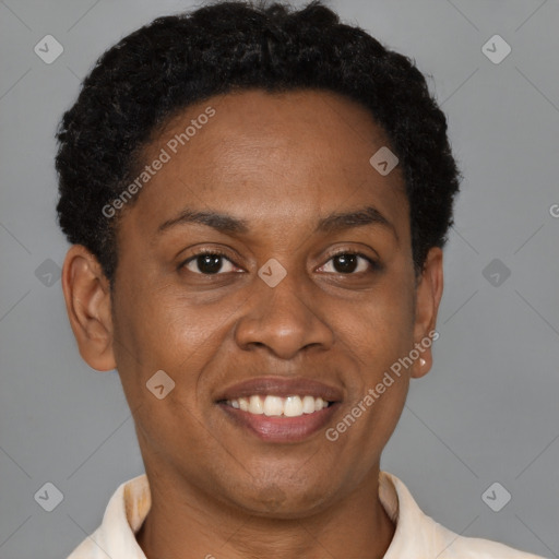 Joyful black adult female with short  brown hair and brown eyes