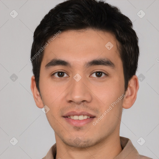 Joyful asian young-adult male with short  black hair and brown eyes