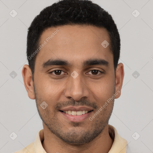 Joyful latino young-adult male with short  brown hair and brown eyes