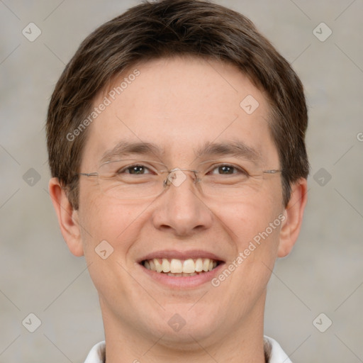 Joyful white adult male with short  brown hair and brown eyes