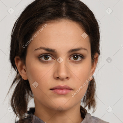 Neutral white young-adult female with medium  brown hair and brown eyes