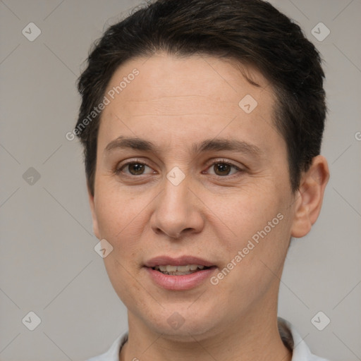 Joyful white adult female with short  brown hair and brown eyes