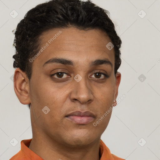 Neutral latino young-adult male with short  brown hair and brown eyes