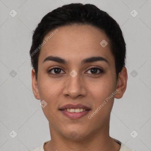 Joyful latino young-adult female with short  black hair and brown eyes