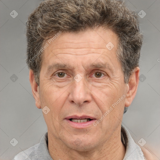 Joyful white middle-aged male with short  brown hair and brown eyes