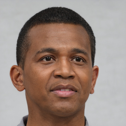 Neutral black young-adult male with short  brown hair and brown eyes