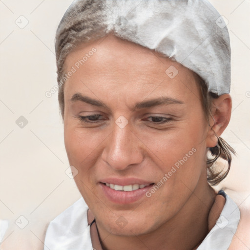 Joyful white adult female with short  brown hair and brown eyes