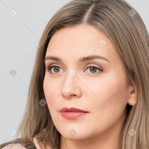 Neutral white young-adult female with long  brown hair and brown eyes