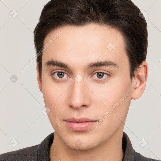 Neutral white young-adult male with short  brown hair and brown eyes