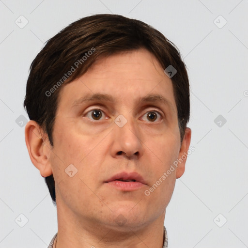 Neutral white adult male with short  brown hair and brown eyes