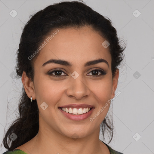 Joyful latino young-adult female with medium  brown hair and brown eyes