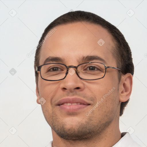 Joyful white adult male with short  brown hair and brown eyes