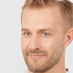 Joyful white adult male with short  brown hair and grey eyes