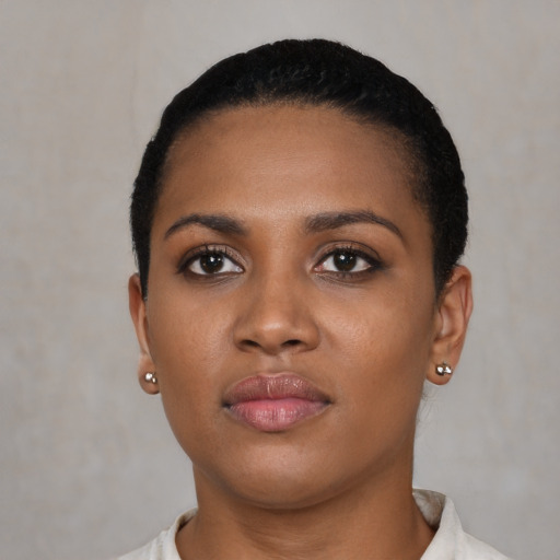 Neutral black young-adult female with short  black hair and brown eyes