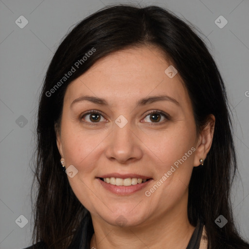 Joyful white adult female with long  brown hair and brown eyes