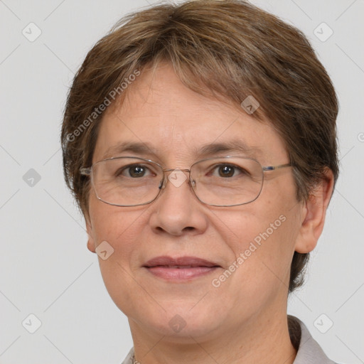 Joyful white adult female with short  brown hair and brown eyes