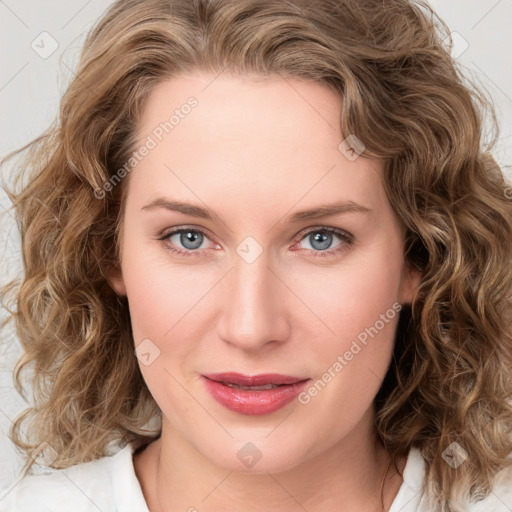 Joyful white young-adult female with medium  brown hair and blue eyes