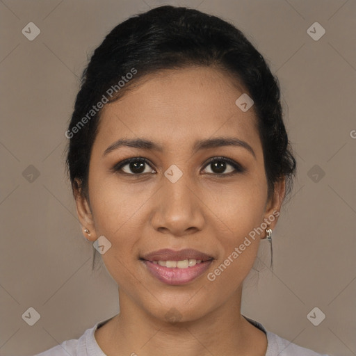 Joyful latino young-adult female with short  brown hair and brown eyes