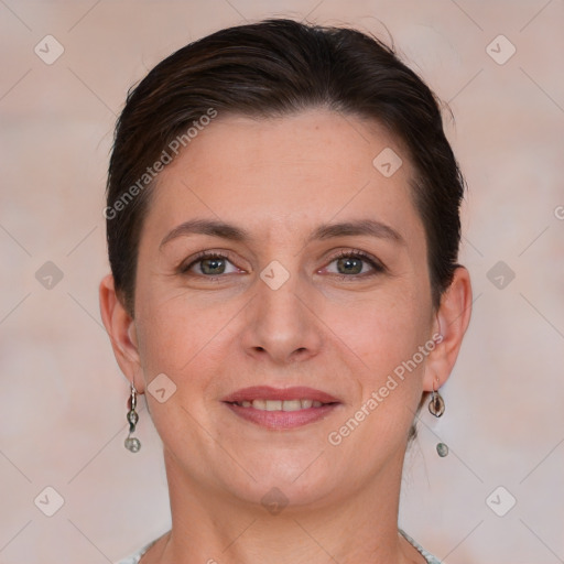 Joyful white young-adult female with short  brown hair and grey eyes