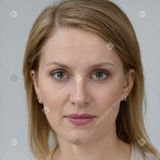 Joyful white young-adult female with medium  brown hair and blue eyes