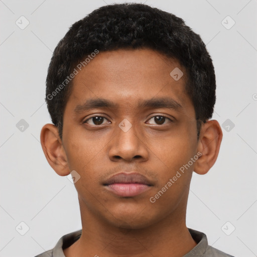 Neutral black young-adult male with short  brown hair and brown eyes