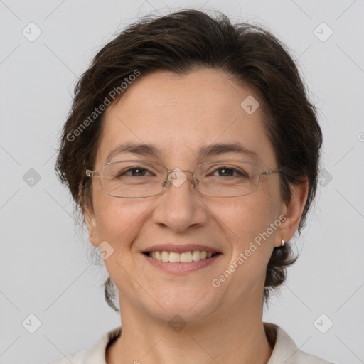 Joyful white adult female with short  brown hair and brown eyes