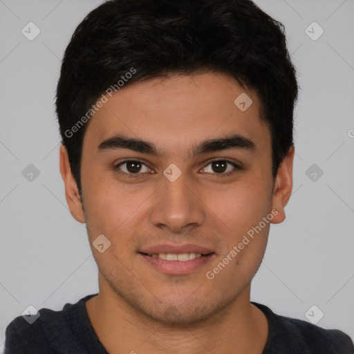 Joyful white young-adult male with short  black hair and brown eyes