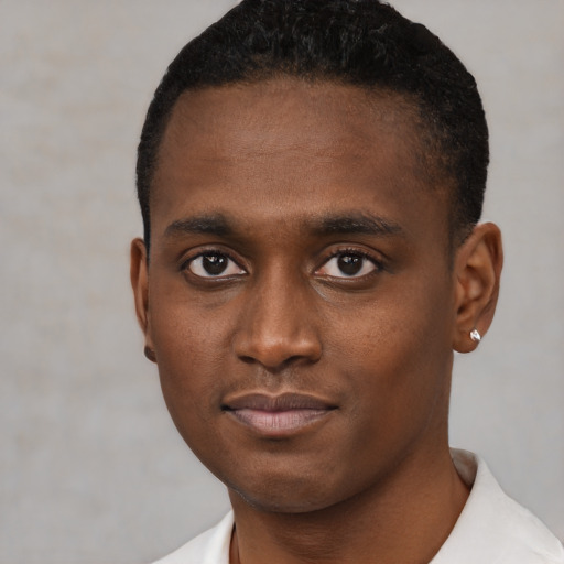 Neutral black young-adult male with short  brown hair and brown eyes