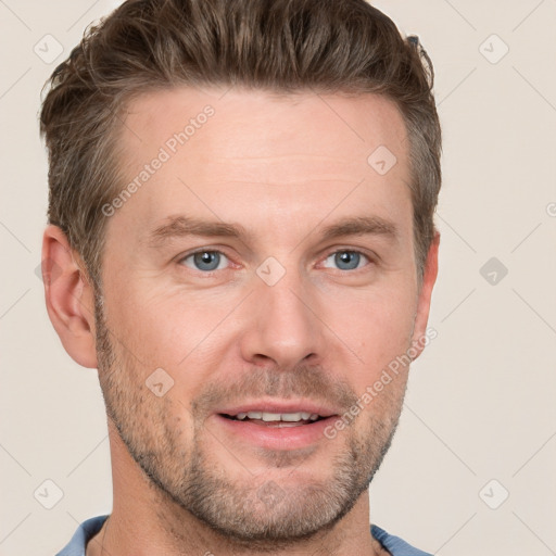 Joyful white adult male with short  brown hair and grey eyes