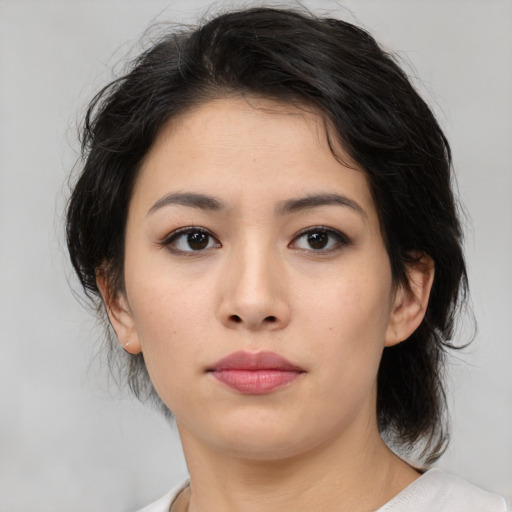 Neutral asian young-adult female with medium  brown hair and brown eyes