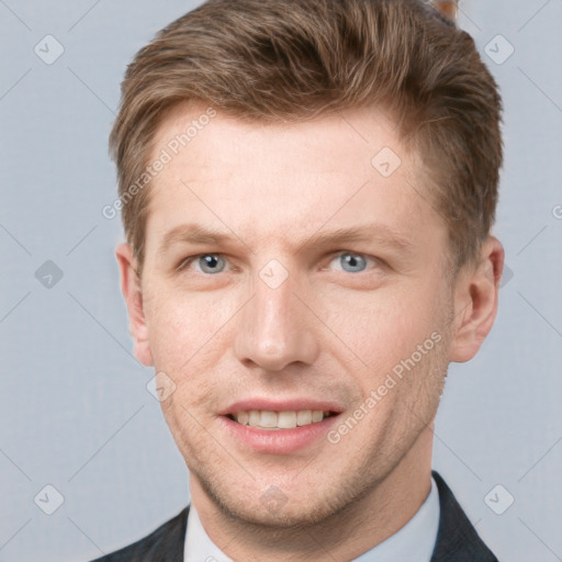 Joyful white adult male with short  brown hair and grey eyes