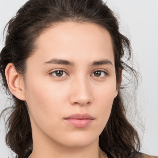 Neutral white young-adult female with medium  brown hair and brown eyes