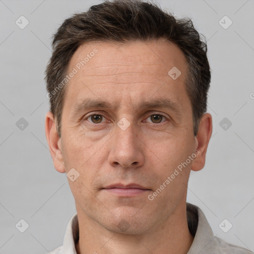 Neutral white adult male with short  brown hair and brown eyes