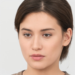 Neutral white young-adult female with medium  brown hair and brown eyes