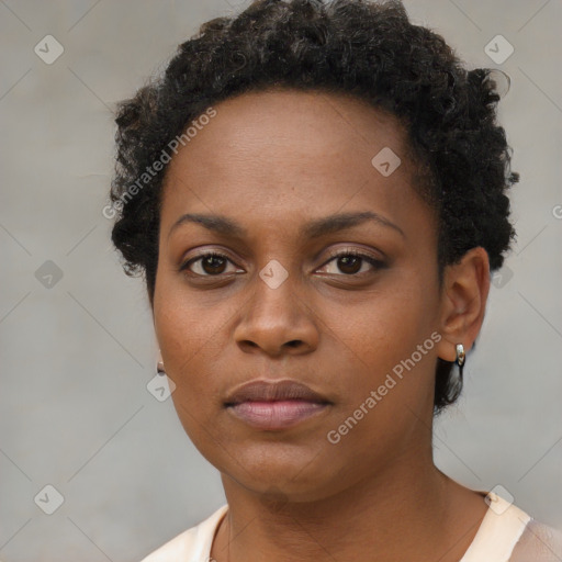 Neutral black young-adult female with short  brown hair and brown eyes