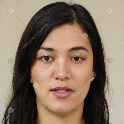 Joyful asian young-adult female with long  brown hair and brown eyes