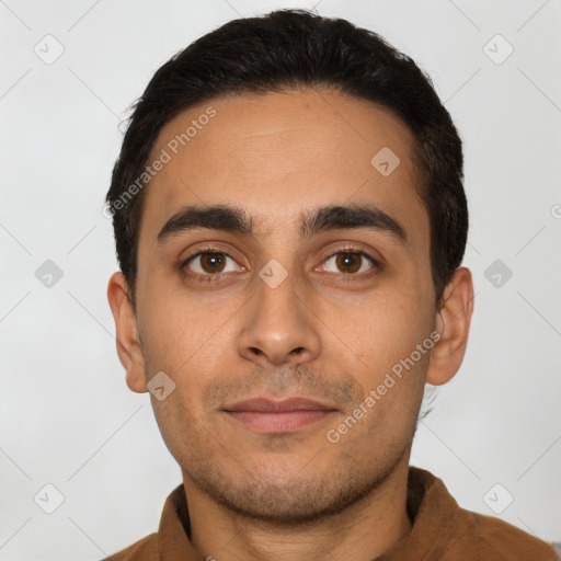 Neutral white young-adult male with short  brown hair and brown eyes