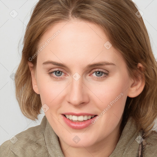 Joyful white young-adult female with medium  brown hair and blue eyes