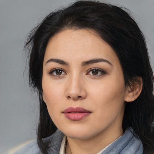 Neutral latino young-adult female with long  black hair and brown eyes
