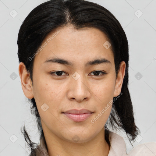 Joyful asian young-adult female with medium  brown hair and brown eyes