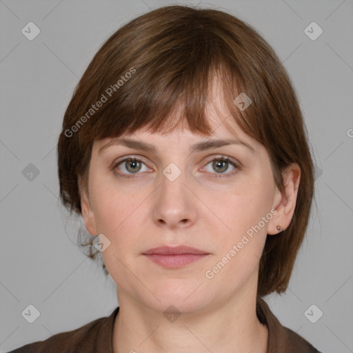 Neutral white young-adult female with medium  brown hair and grey eyes