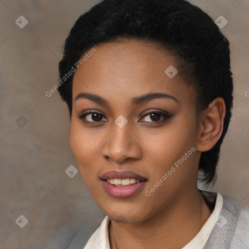 Joyful black young-adult female with short  black hair and brown eyes