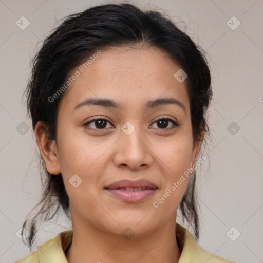 Joyful latino young-adult female with medium  brown hair and brown eyes