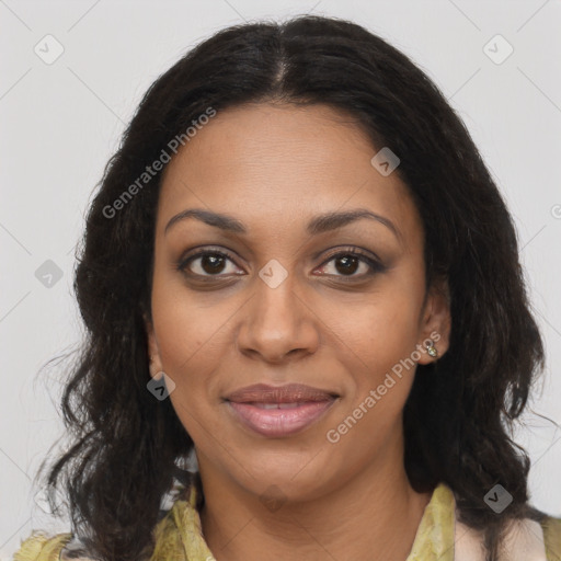 Joyful black young-adult female with long  brown hair and brown eyes