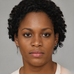 Neutral black young-adult female with short  brown hair and brown eyes