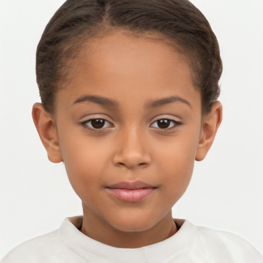 Joyful latino child female with short  brown hair and brown eyes